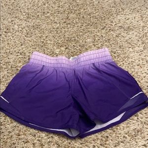Light purple and dark purple athletic shorts